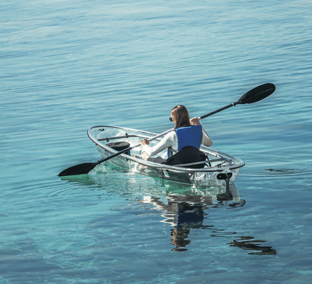 Screenshot 2024-06-09 at 6.51.45 PM a person riding on the back of a boat in the water